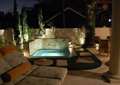 Spa with turning leaf flagstone and concrete coping