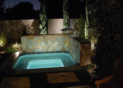 Spa with turning leaf flagstone and concrete coping